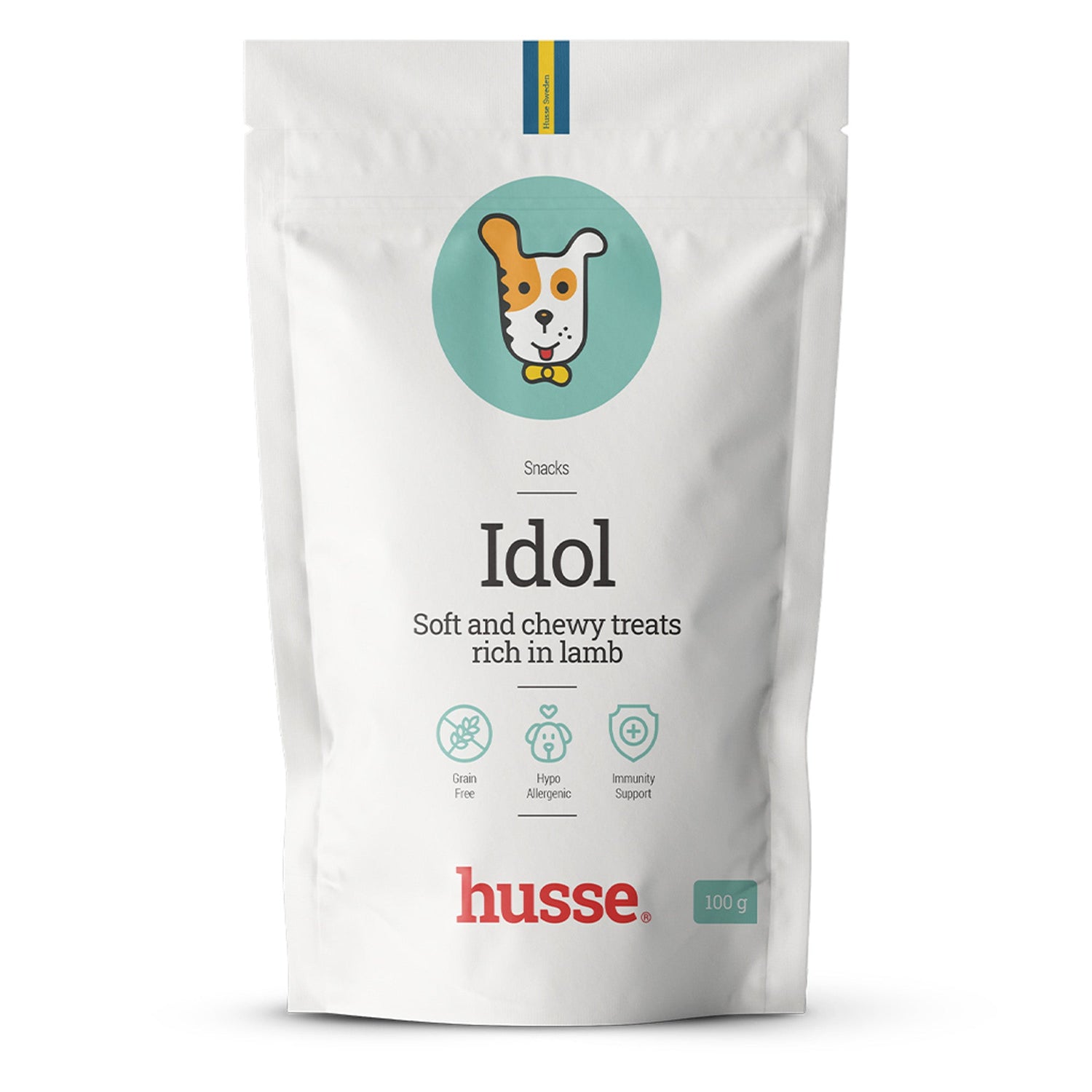 Embalagem branca de 100 g de snacks macios Husse Idol sem cereais ricos em borrego com ilustração de cão.