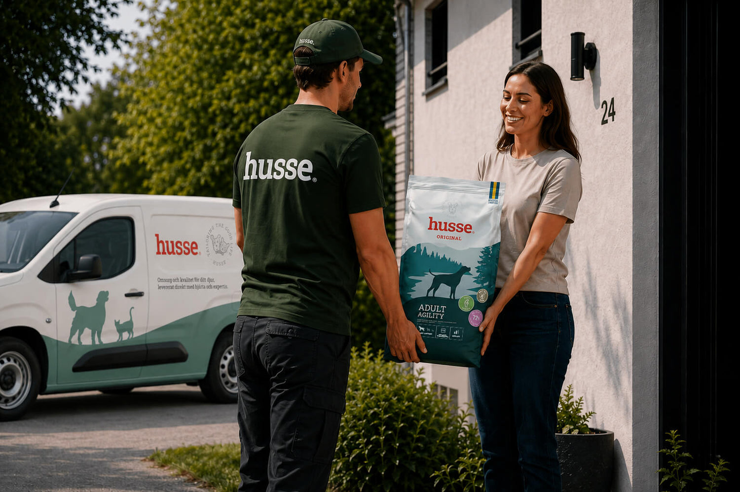 Husse advisor delivering pet food from a branded van to a customer's front door