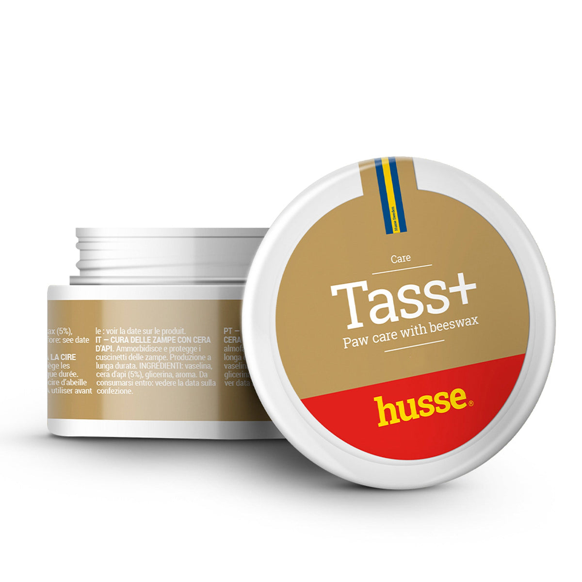 Bálsamo Tass Plus com cera de abelha da Husse em boião branco com tampa dourada para proteger as patas.