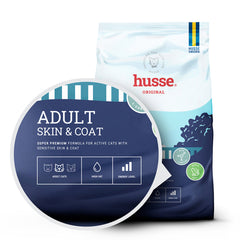 husse Adult Skin & Coat cat food bag with a circular zoom showing high fat and energy level icons.