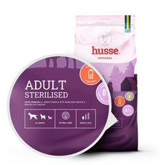 Husse Adult Sterilised dry dog food bag in purple and white, highlighting energy control and optimal fibre for your dog.