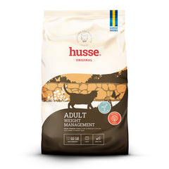 Husse Adult Weight Management dry cat food bag in cream and brown, featuring a cat silhouette in a garden scene.