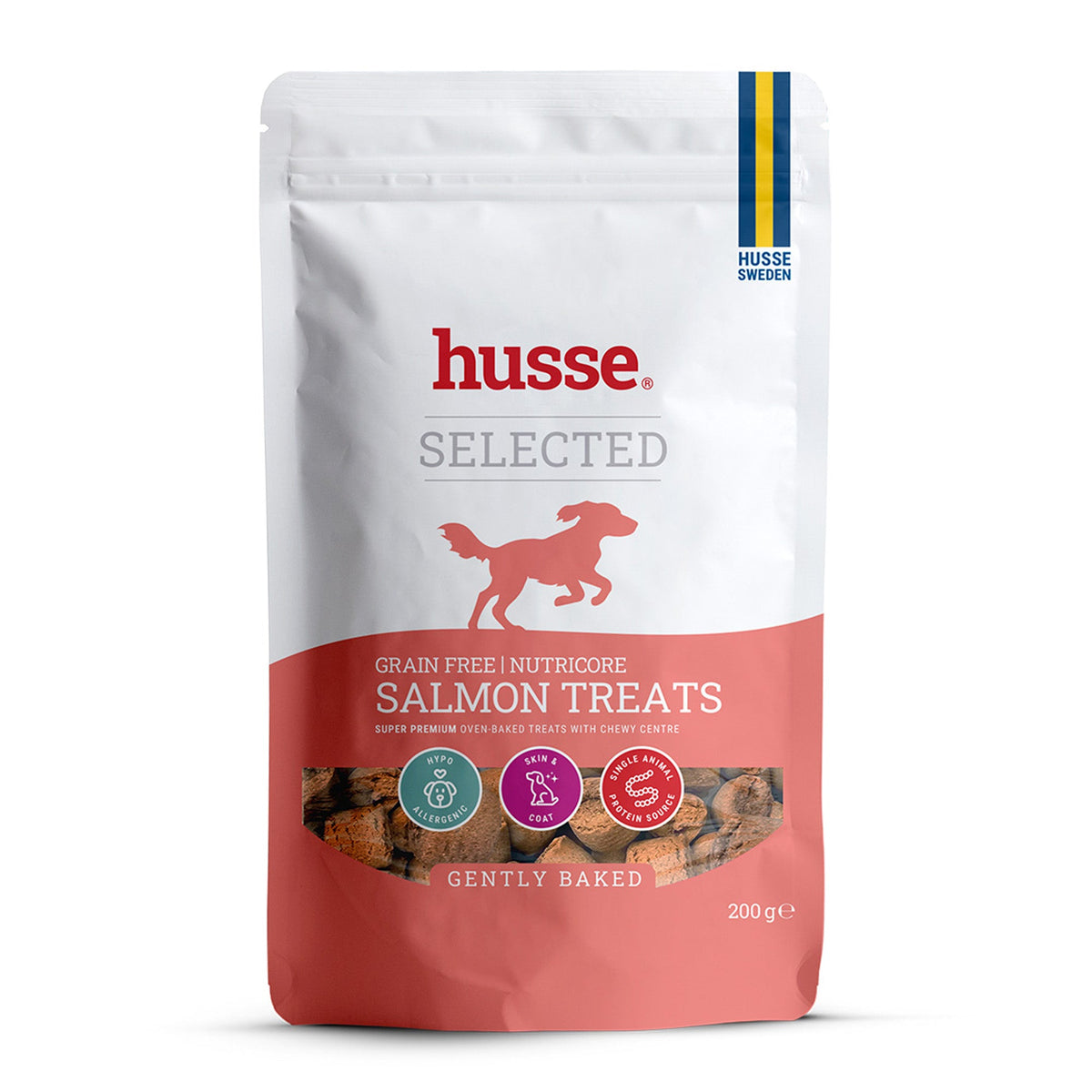 Petiscos de salmão sem cereais Husse Nutricore em embalagem branca e pêssego para a pele e o pelo do seu cão.