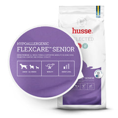 Ração para cães Husse Hypoallergenic Flexcare™ Senior em saco roxo, para conforto articular e mobilidade.