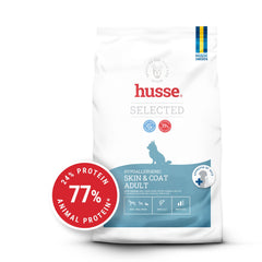 Saco de ração Husse Hypoallergenic Skin & Coat Adult para cães pequenos, com onda azul e selo de proteína vermelho.