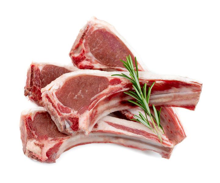 Raw lamb cutlets with rosemary, used as a protein source in Husse recipes